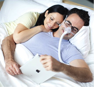 a man using cpap mask