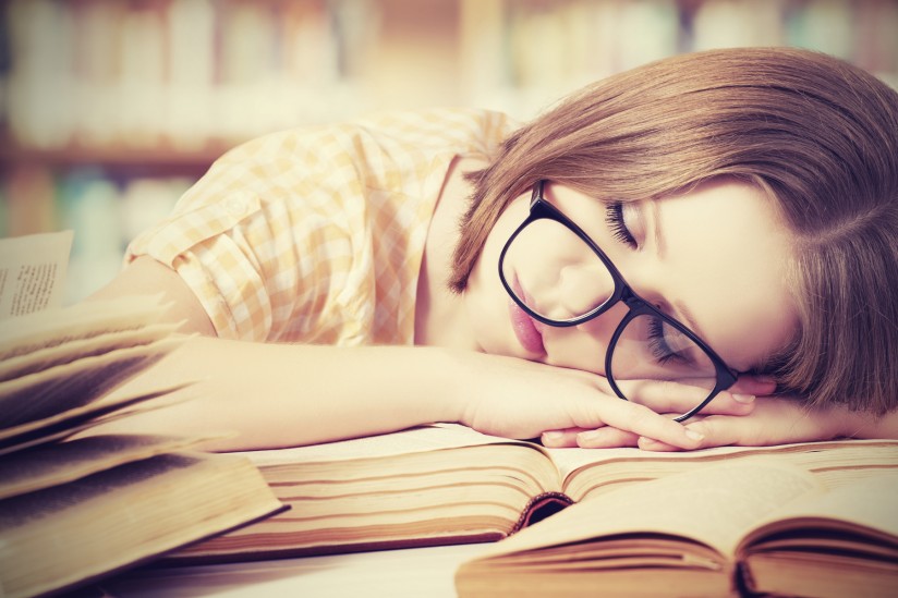 a studen felt asleep reading a book