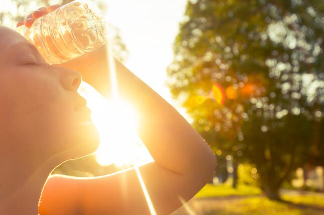 a woman suffering the heat