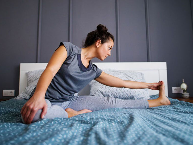 woman streching before sleep